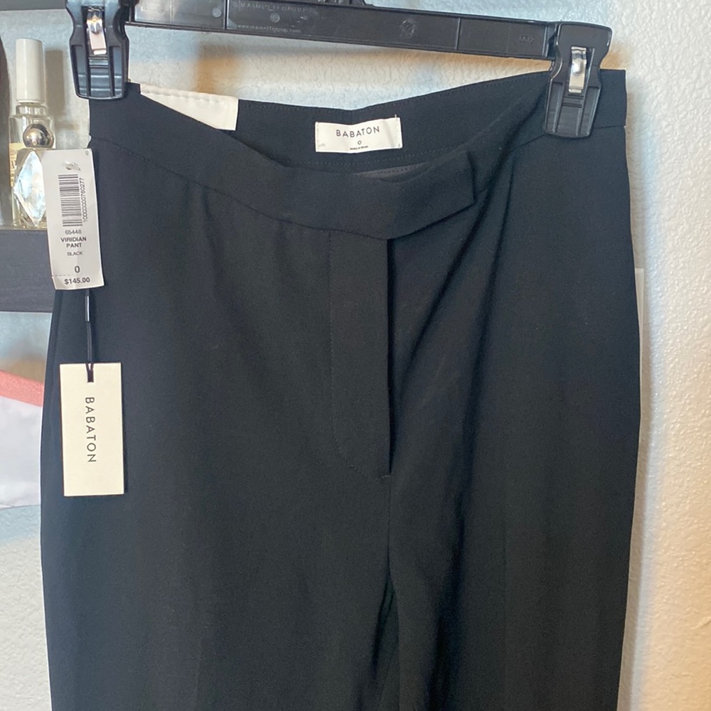 Formal dress pants/ trousers. Black. High waisted, slim fitting.